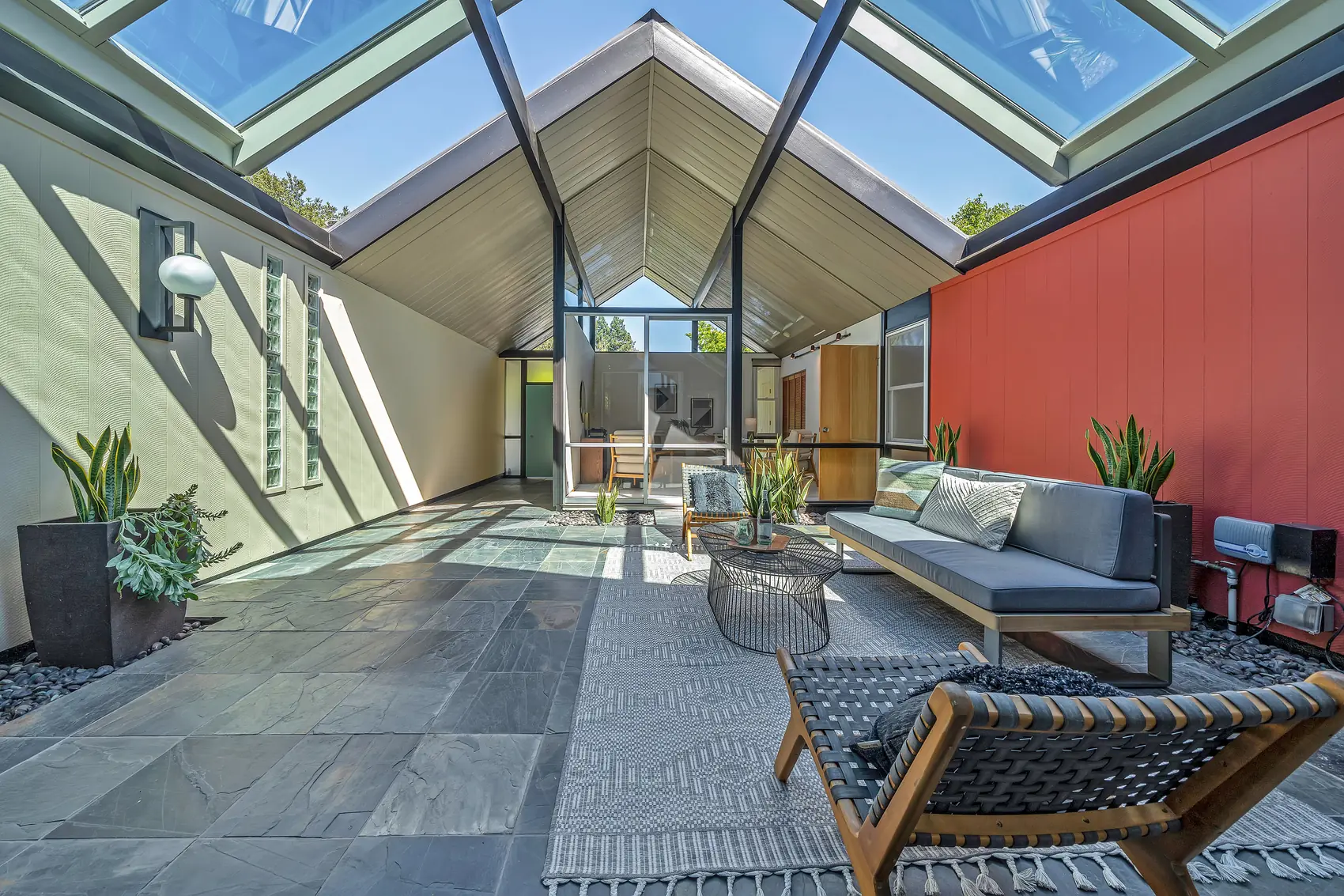 The atrium at 1674 Alexander Way. The room the plan is built around, and the reason this tract prices the way it does.