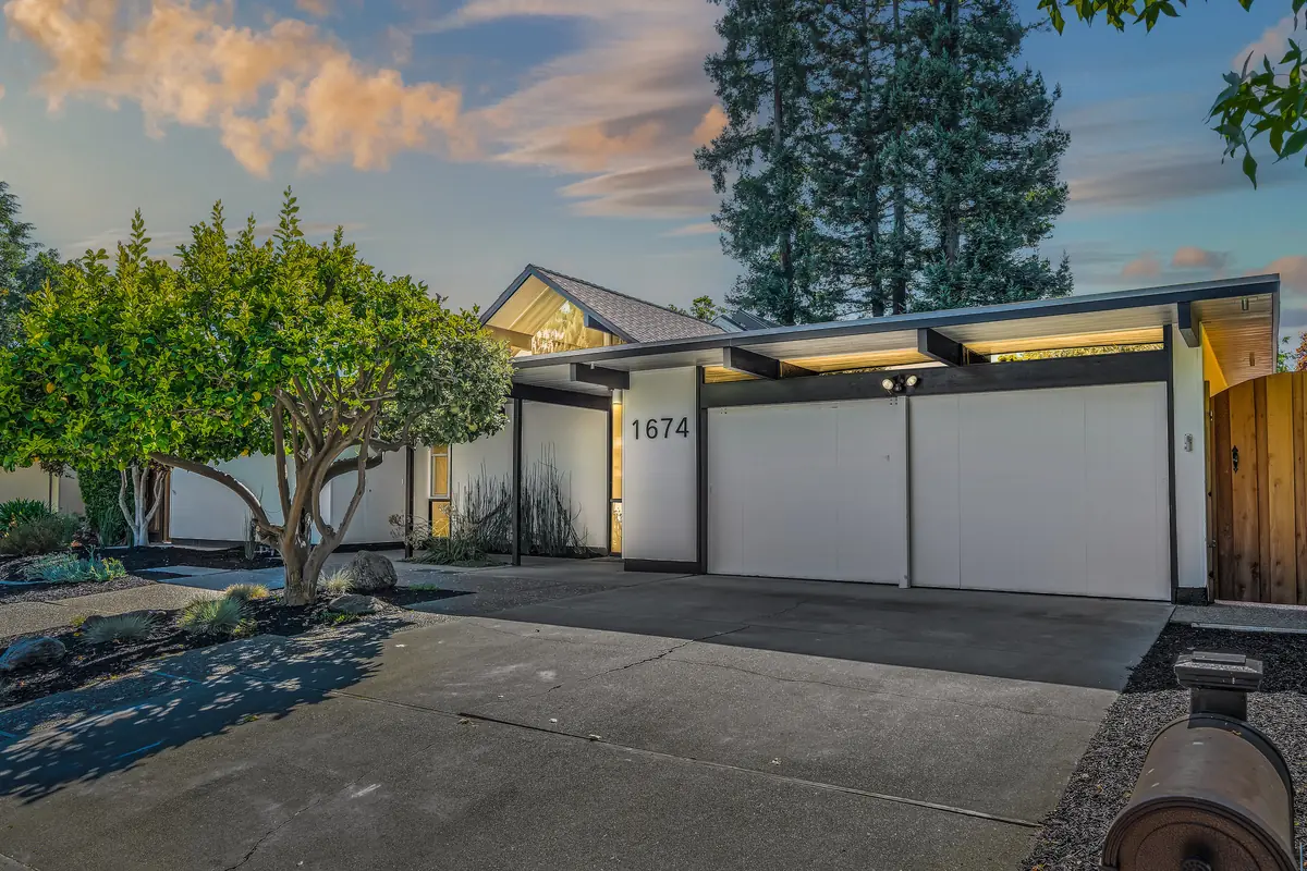 1674 Alexander Way, Los Altos, from the street at dusk.